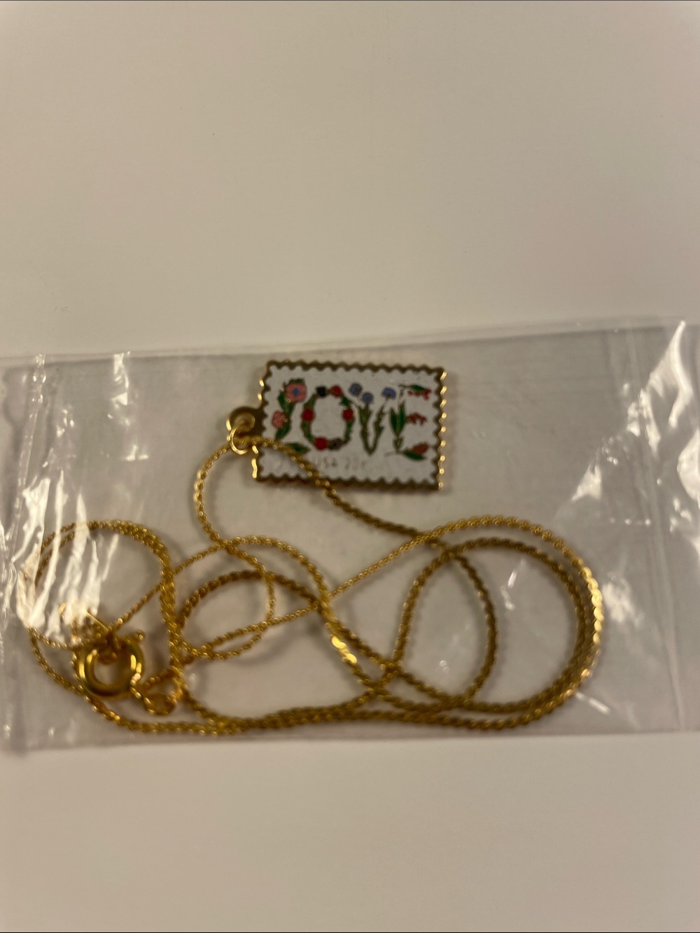 Gold Floral 'LOVE' Pendant Necklace